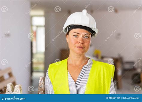 Confident Female Civil Engineer Standing Inside Building Under