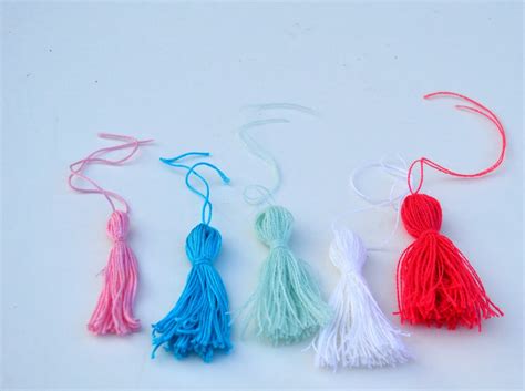 How do you pull embroidery floss through? How to make embroidery floss tassels