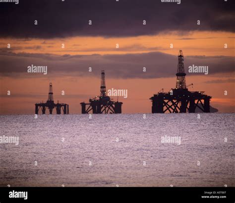 Semi Submersible Oil Rigs Sunrise Firth Of Forth Scotland Stock Photo