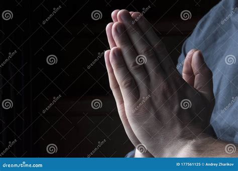 Hands Folded In Prayer Hands Of A Man A Man Is Praying Stock Image