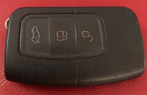 The battery junction box/power distribution box located under the hood and the smart junction box/passenger compartment fuse panel. Changed battery in key fob - Ford Focus Club - Ford Owners ...