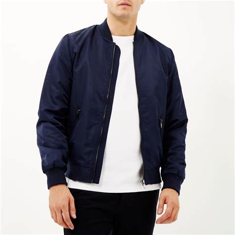 Check spelling or type a new query. River Island Synthetic Navy Blue Bomber Jacket in Pink - Lyst