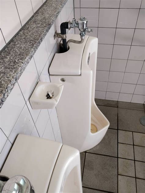 This Public Bathroom Has Ashtrays Next To The Urinals Rmildlyinteresting