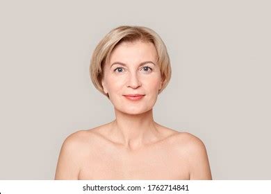 Naked Mature Woman Standing Isolated On Stock Photo 1762714841