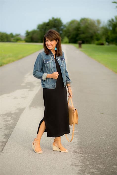 Black Maxi Dress And Denim Jacket Cyndi Spivey Black Maxi Dress Outfit Maxi Outfits Maxi