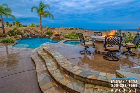 Backyard fire pit laws & regulations expert tips | rst. Raised seating and fire pit area | California pools ...