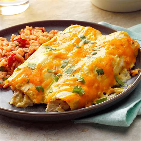 Seriously the best chicken enchiladas ever, made with lots of chicken, cheese, black beans (optional), and my favorite homemade red enchilada sauce recipe. Creamy Chicken Enchiladas Recipe | Taste of Home