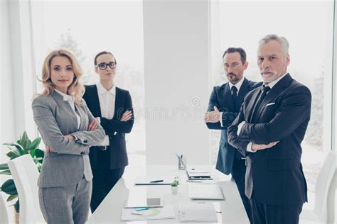 Two Stylish Business Persons In Suits Having Disagreement War Stock