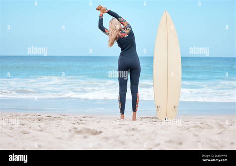 Surfing Stretching And Woman Surfer On Beach Standing By Surfboard Blue Sky Ocean And Girl
