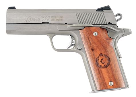 Coonan 357 Magnum Semi Auto Pistol Table Top Overview Field Strip Images And Photos Finder