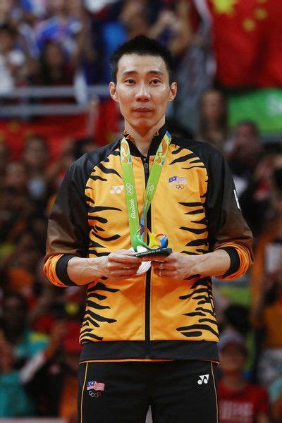 As we said, badminton is mostly dominated by south asian countries. Silver medalist Chong Wei Lee of Malaysia poses on the ...