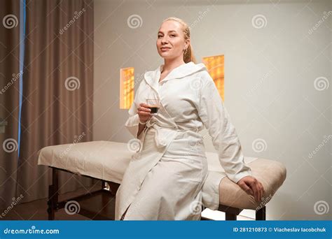 Blonde Female In A Bathrobe Sits In A Massage Room Stock Image Image Of Horizontal Female