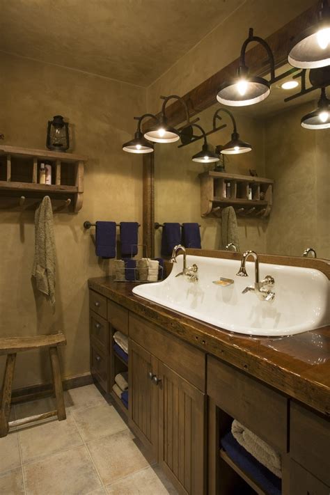 Find rustic bathroom vanity cabinets. Castiron 4' sink. Rustic mountain lodge bathroom. Wood ...
