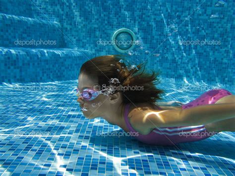 Happy Smiling Underwater Child In Swimming Pool — Stock Photo © Jaysi