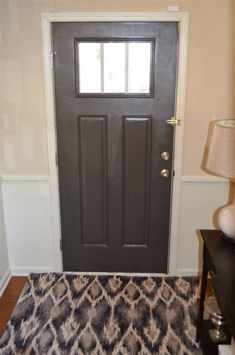 I tend to like it with white for an extreme contrast and with a soft gray. Grey front door, Sherwin Williams Urbane Bronze ...
