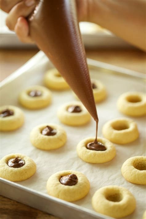 Nah, sekarang anda dapat menikmati keduanya dalam masa kurang dari 20 minit dengan nutella brownies ini. Nutella Cookies Pot yang meletup! letup! - masam manis