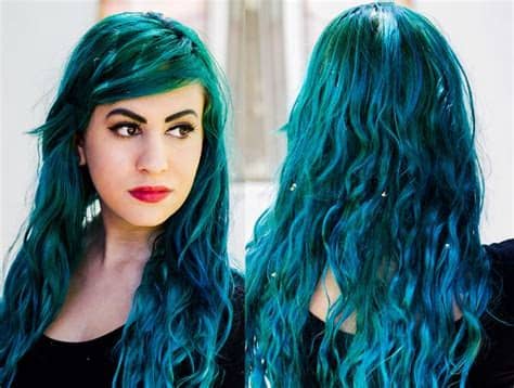 This short bob hairstyle combines the natural black root color with some blue hair dye and foiling to create panels of color. Teal Hair Dye, Best Brands, Dark, Teal Blue, Green ...