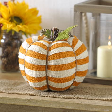 Brighten up your fall decor with our Orange Striped Burlap Pumpkin. The