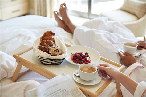 Couple Having Breakfast In Bed By Stocksy Contributor Trinette Reed Stocksy