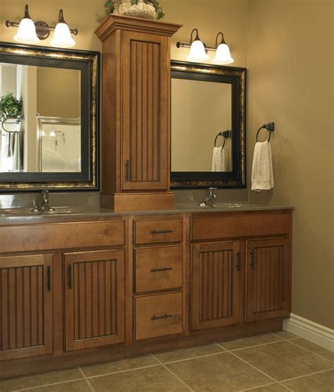 The most common double vanity with sinks material is metal. Double vanity with lamp lighting above the mirror ...