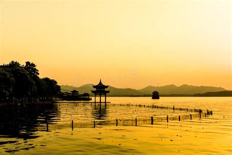 The Beautiful Of Silhouette Sunset Landscape Scenery Of Xihu West Lake