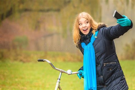Happy Woman With Bike In Park Taking Selfie Photo Stock Image Image Of Fall Self 65053197