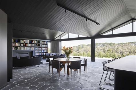 Pitched Roofs Cover This Dark And Moody Farmhouse