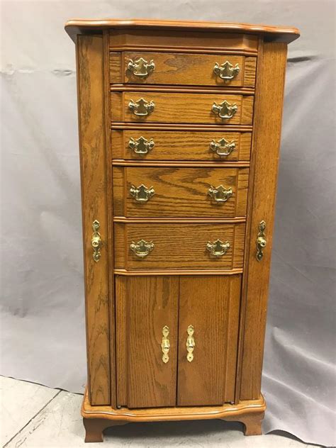 Sold Price Tall Oak Multi Drawer And Door Jewelry Cabinet Invalid