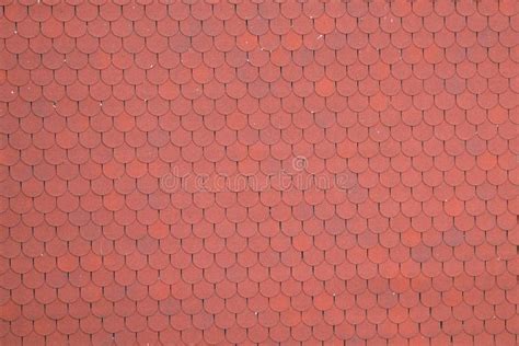 Close Up View On Red Bitumen Asphalt Roof Shingles Background Stock