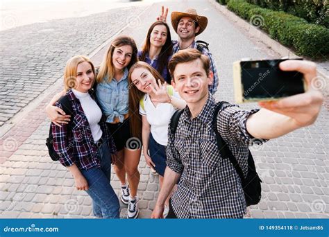 Group Of Friends Taking Selfie At Camera In City Stock Photo Image Of