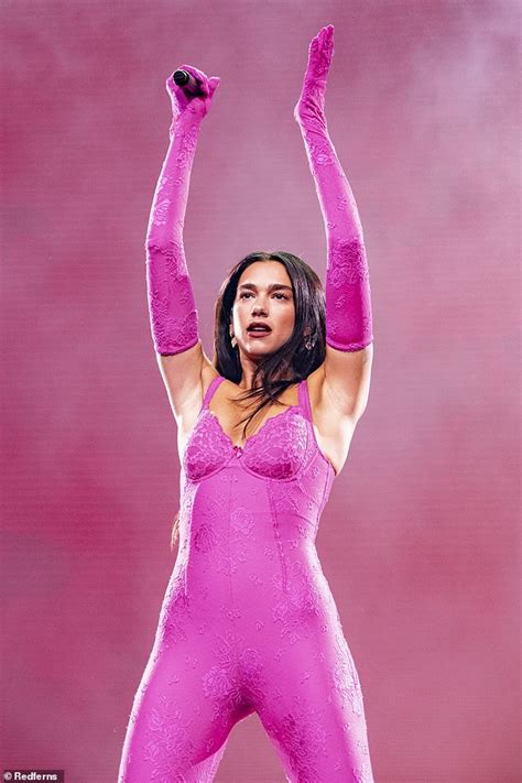 Dua Lipa Flaunts Her Incredible Figure In A Skintight Pink Catsuit On Tour Daily Mail Online