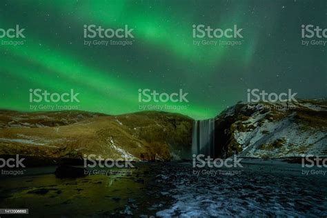 Northern Lights Over Skogafoss Stock Photo Download Image Now