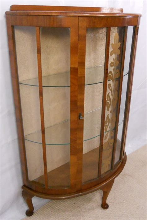 Wipe off dust with a tack cloth. 1950 s Walnut China Display Cabinet - SOLD