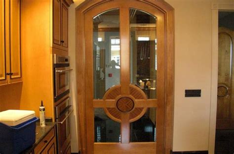 The first step to front door refinishing is to take the door off its hinges. Refinish exterior doors