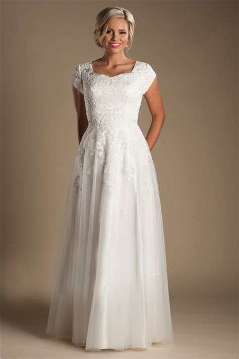 This cap sleeve sheath wedding dress is simply elegant, with corded lace from the high neckline to the sweep train. Modest Sheath Cap Sleeve Tulle Lace Wedding Dress Without ...