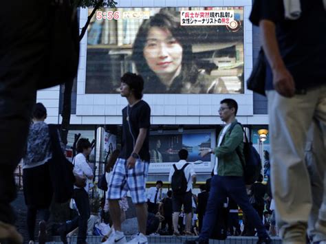 body of japanese reporter killed in syria flown home inquirer news