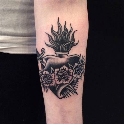 For example, a sacred heart surrounded by thorns is traditionally used to represent jesus, while a sacred heart encircled by lilies or white roses is for the immaculate heart of mary. Pin on Love Tattoos