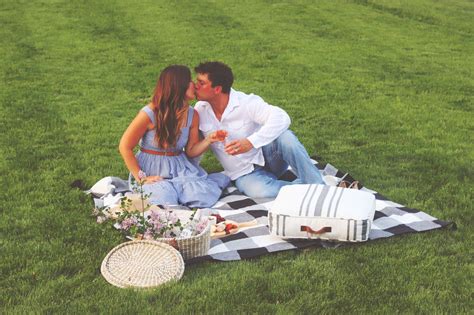 Kissing Couple Backyard Picnic For Date Night Romantic Date Night Ideas Romantic Dates At Home