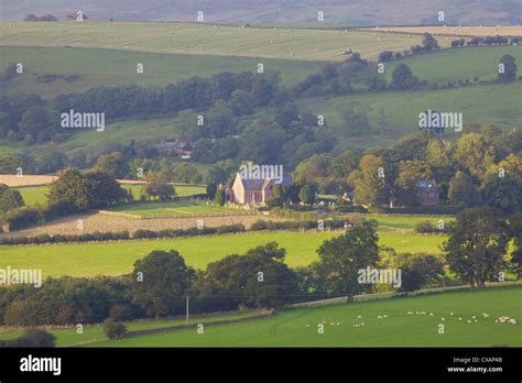 St Michaels Church Wit Trees And Fields In Golden Light On A Summers