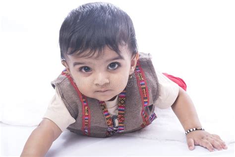 Happy And Healthy Indian Baby Boy With Playful Gesture Stock Image
