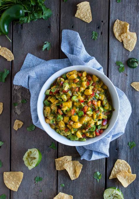 I now have a new addition to my arsenal of party dishes. Mango Avocado Salsa - Feasting not Fasting
