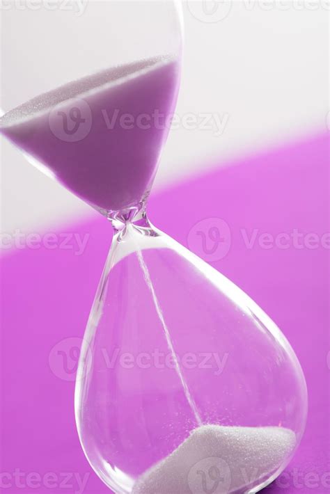 Sand Running Through An Hourglass 10331248 Stock Photo At Vecteezy