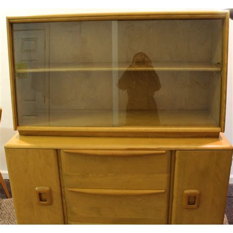 Maybe you would like to learn more about one of these? Mid Century Modern Heywood Wakefield China Cabinet | Chairish