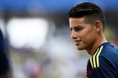 Colombias Midfielder James Rodriguez Smiles As He Warms Up Before The