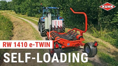 Kuhn Rw 1410 E Twin Round Bale Wrappers In Action Youtube