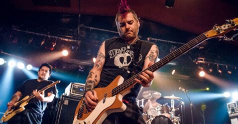 nofx s fat mike lets fan kick him back after brutal onstage beatdown video huffpost news