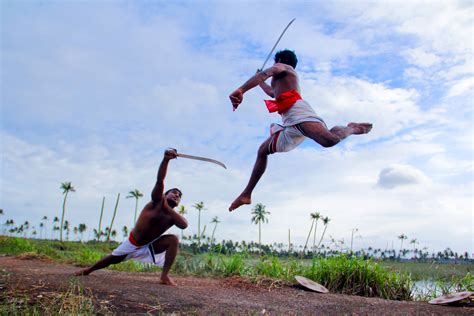 Two Men Holding Sword Fighting During Daytime Free Image Peakpx
