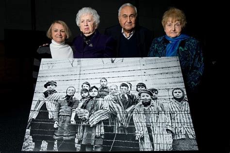 Auschwitz Survivors Photographed As Children In Camp In 1945 Reunite