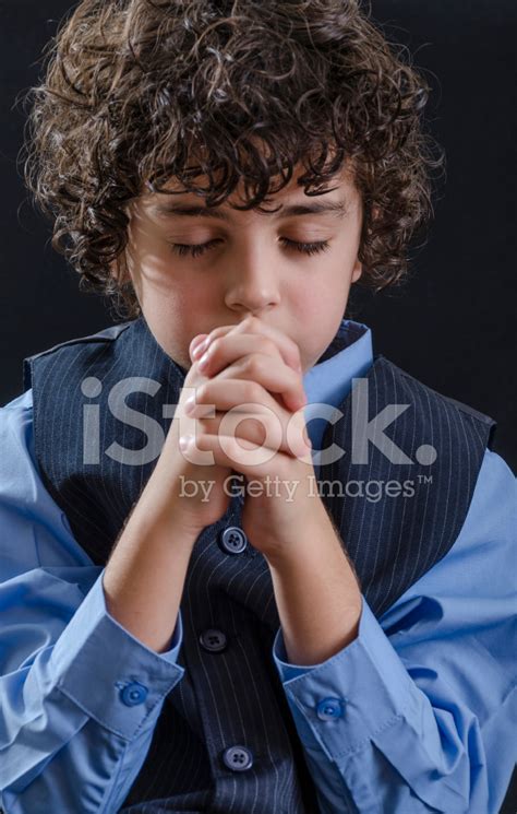 Young Boy Praying Stock Photo Royalty Free Freeimages