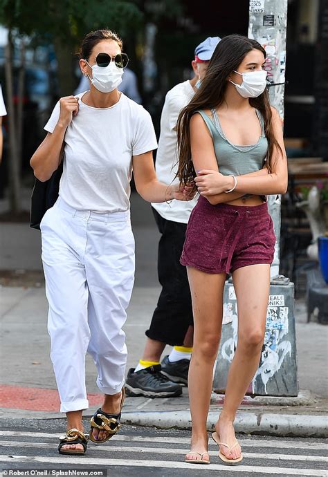 katie holmes and daughter suri cruise 15 brave the summer heat while stepping out for dinner